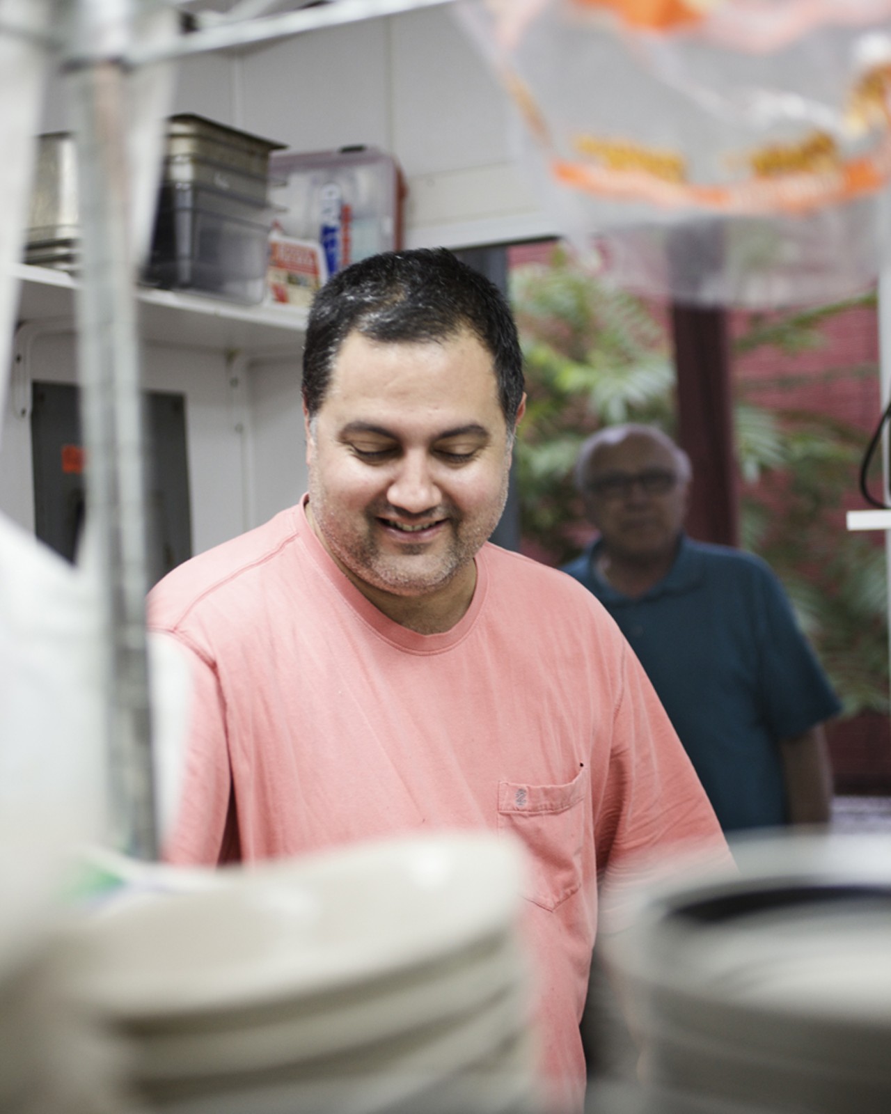 At work in the kitchen, New Orleans native and owner of Riverbend Restaurant & Bar, Sam Kogos.