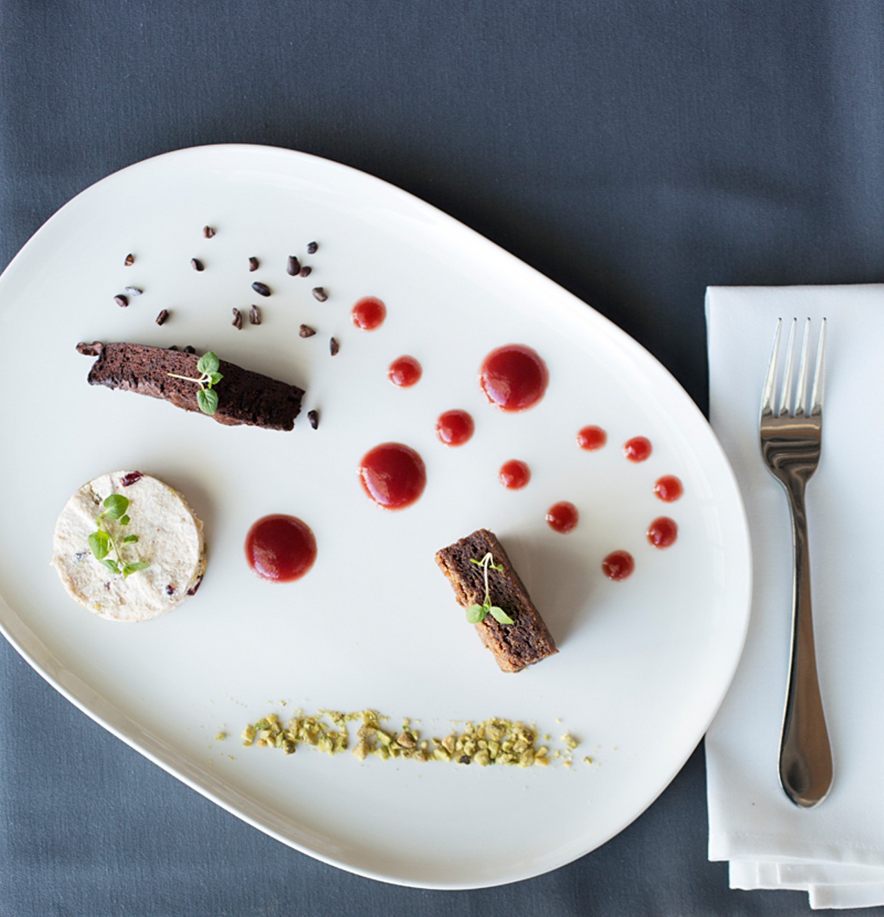 "Chocolate, Fruit, Frozen" is chocolate sponge and persimmon cake with persimmon-cranberry-pistachio semifreddo.