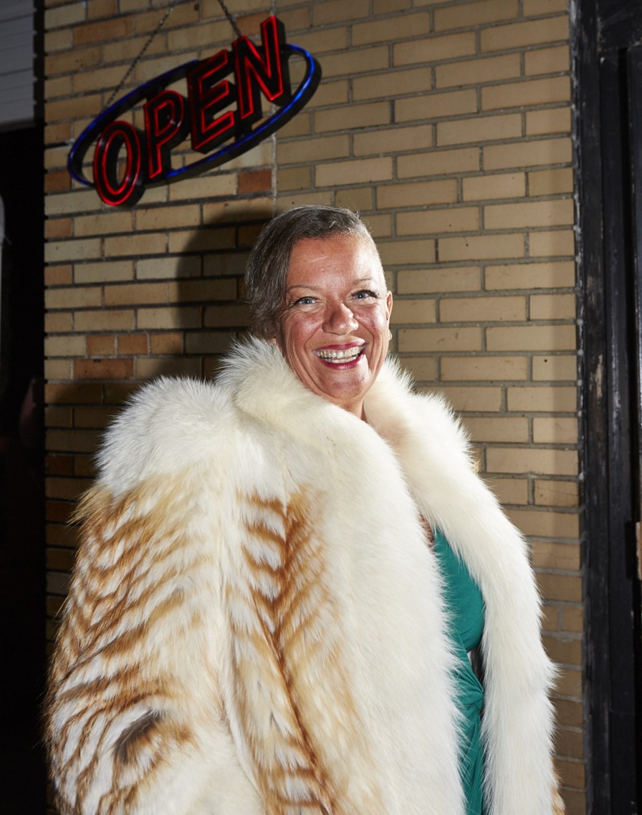 One of the judges of the competition, Karen Ultra, poses outside JJ's Clubhouse. Someone once asked her about her fur coat,  saying, "Don't you think it's cruel what people do to the animals?" In her telling, she replied, "Baby, you have no idea what I do to people."