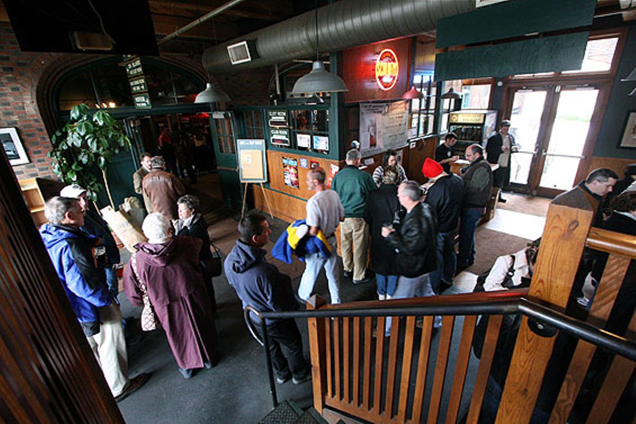 Patrons arrive inside, where beers were served at 1991 prices from 11 a.m. to 1 a.m.