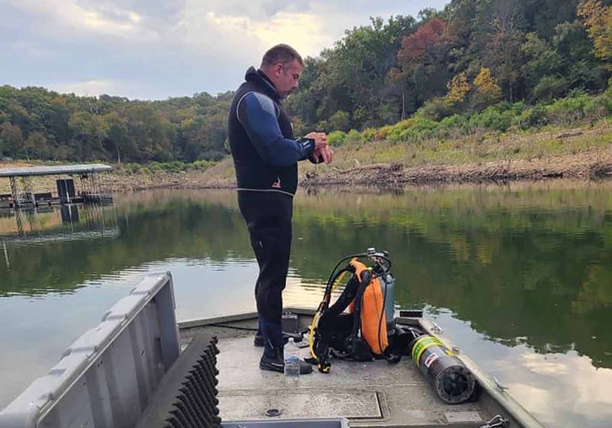 Sheriff Chris Heitman is proud of how he’s used scuba to help families in need — but critics say his focus on diving has been a distraction from his day job.