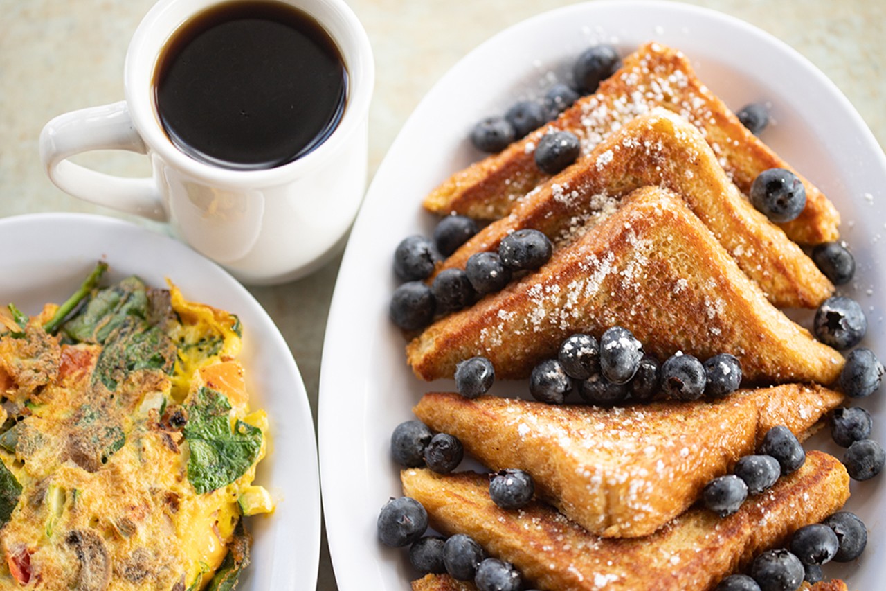 Garden omelet and french toast with blueberries.