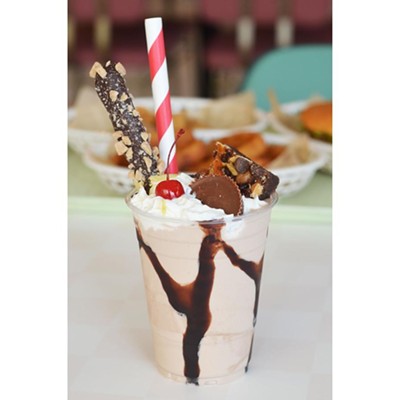 The Everything But... Freak Shake is a chocolate shake topped with chocolate-covered pretzel, potato chips, chocolate-dipped pretzel rod, a Kitchen Sink brownie, caramel sauce, a peanut butter cup and whipped cream.