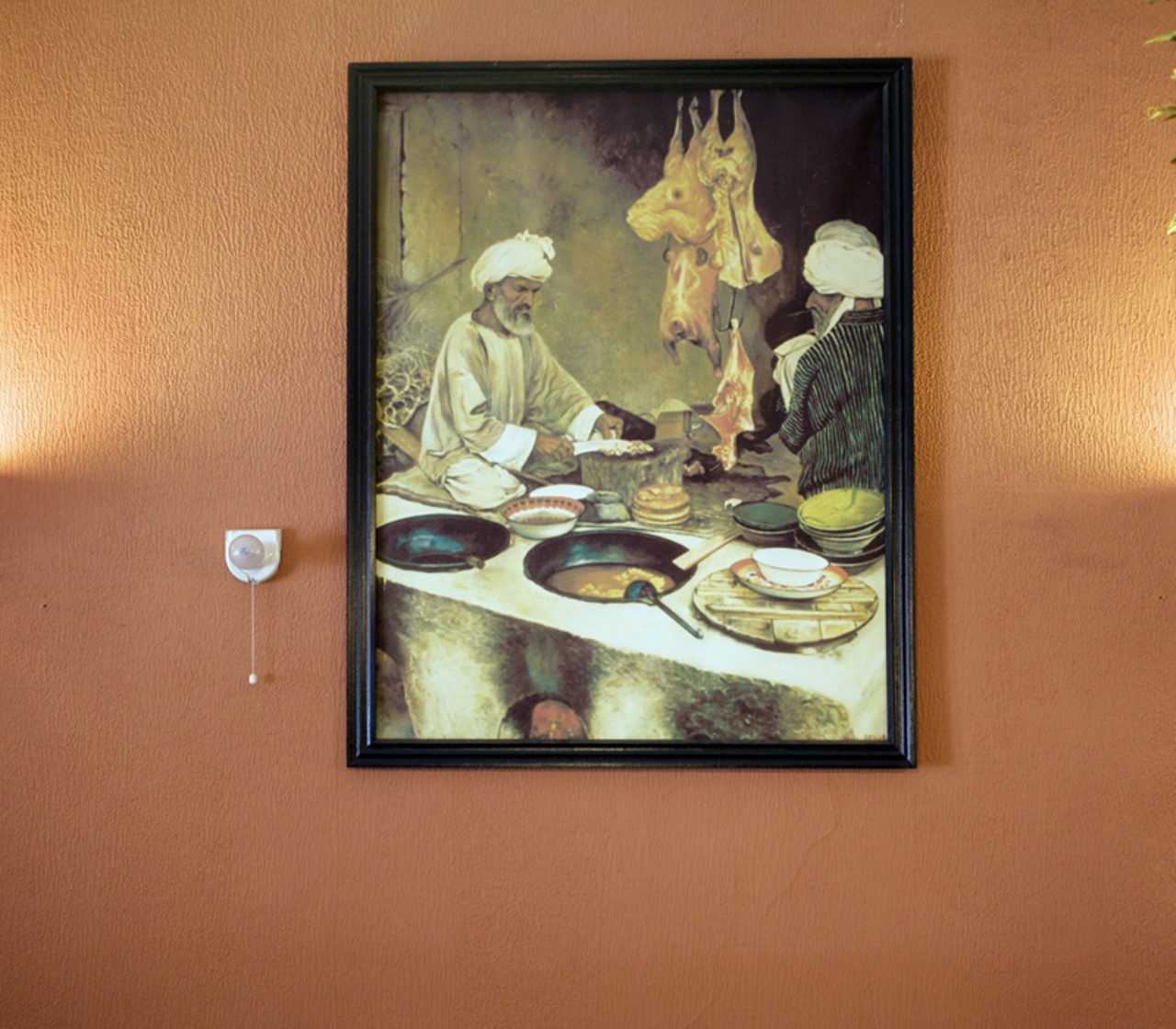 An Afghan painting that adorns the wall.