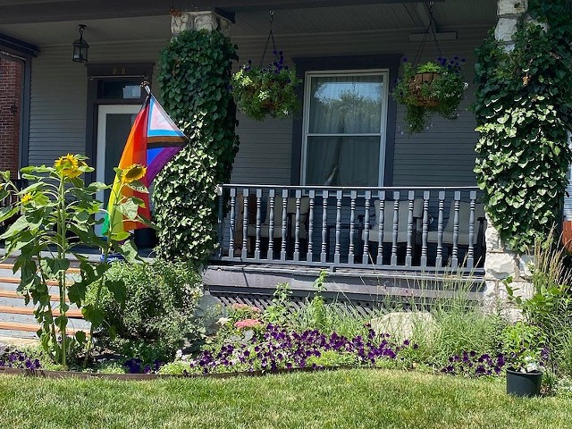 Alex and Kelly Pearson-Potts flew this flag on their porch in solidarity with LGBTQ neighbors.