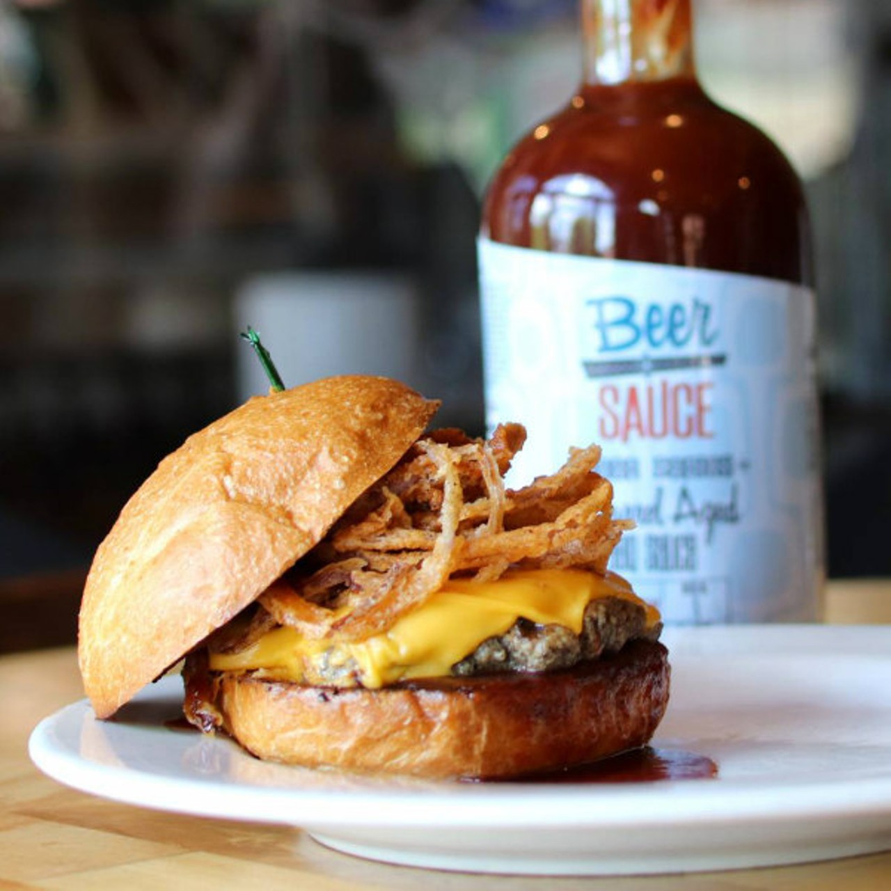 The Schlafly Tap Room
(2100 Locust Street, 314-241-2337)
5 oz. beef patty burger on brioche bun, topped with Beer Sauce Shop's Schlafly barrel-aged BBQ sauce, American cheese and fried onions.