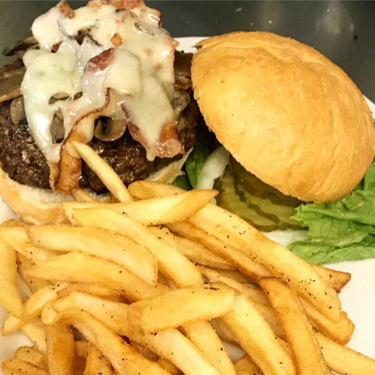 The Concord Grill
(11427 Concord Village Avenue; 314-849-5239)
Jim White Burger: 6 oz. burger with saut&eacute;ed mushroom, bacon and Swiss cheese. Served with seasoned fries.