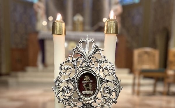 The holy relic: part of the toe bone of St. Louis the King.
