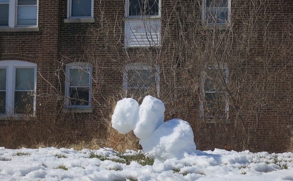 A snowman gives up in St. Louis' Southwest Garden neighborhood.