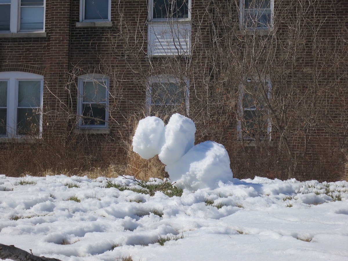 A snowman gives up in St. Louis' Southwest Garden neighborhood.