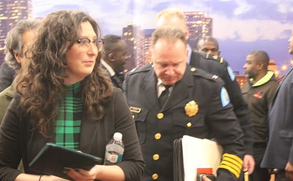 Police Commissioner Robert Tracy, right, with Aldermanic President Megan Green, has been saying in public forums that a new ordinance cracking down on open carry is already having an impact.