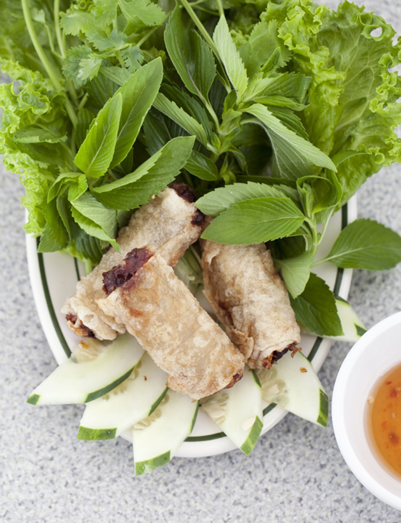 Appetizer - Cha Gio (Vietnamese eggrolls.) Made with ground pork, onion, lettuce, cilantro and cucumber.