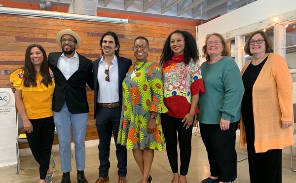 Vanessa Cooksey, RAC CEO and president (center left), and Andréa Purnell, commission chair (center right), announced the new grants today at Old North's Central Print.