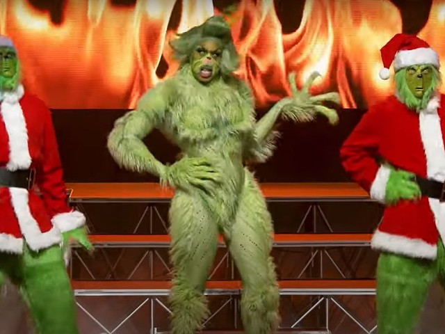 Performers imitate the Grinch at a previous Drag Queen Christmas show.
