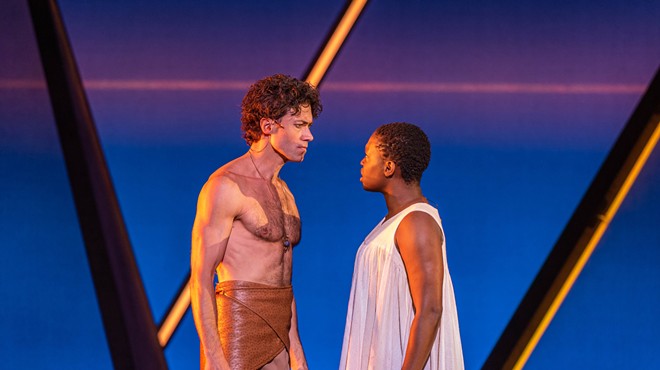Wonu Ogunfowora (right) as Aida and Ace Young (left) as Radames fall in love in Aida.