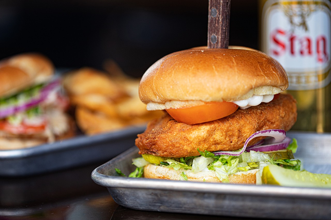 Crispy Chick'n Sandwich with seasoned and house-battered chicken, may, pickles, lettuce, tomato and onion.