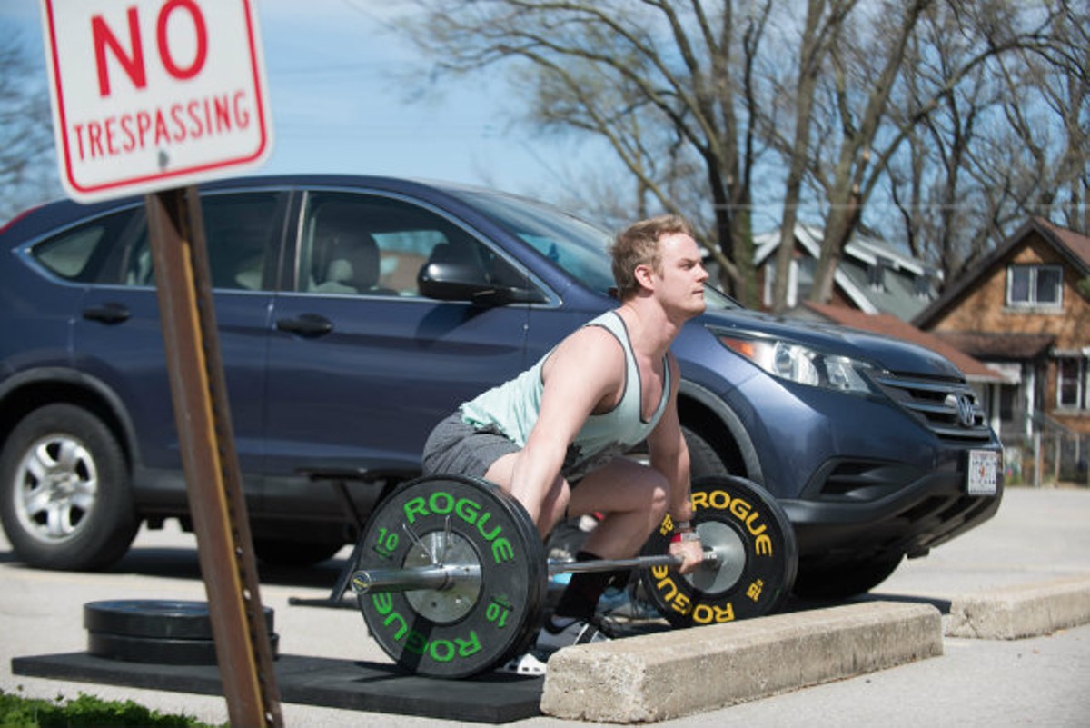 Nick Dondzila can't get to the gym, so he sets up his own in a parking lot.