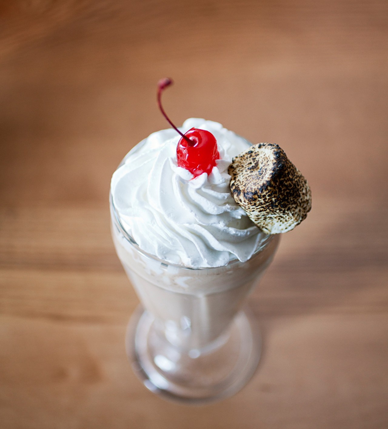 Five Star Burger's chocolate shake is served with whipped cream, toasted marshmallow and a cherry on top, of course!