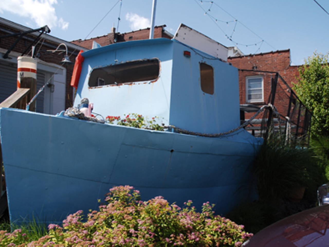 Out behind the Maya Caf&eacute;, guests can eat on the deck of a 1944 model fishing boat that was used as recently as 2000.