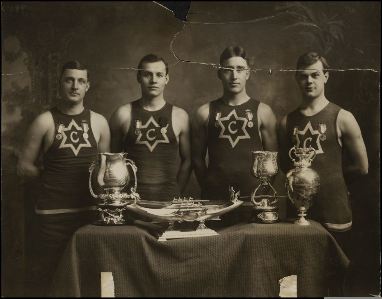 St. Louis was the first Olympics to have medals.
The "gold, silver, bronze" medal format was introduced in 1904. Before the medals, trophies were given out. This photo shows the four-oared race winning team.