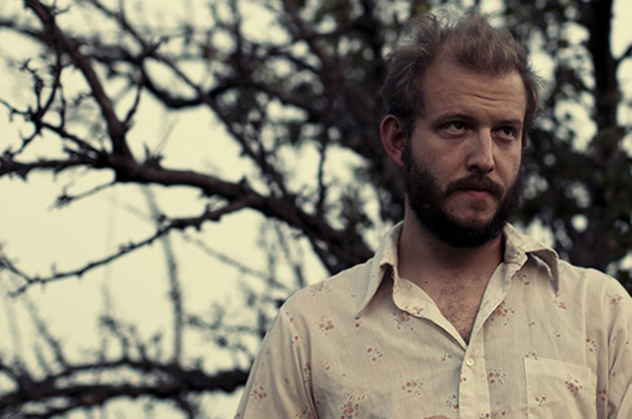 1. Bon Iver
"But the melodies! The harmonies!" You protest. Sorry, but it's time to admit that Bon Iver is the sonic equivalent of an empty canvas totebag. Worse, the Justin Vernon-fronted act is wholly indicative of our musical fall from grace. What happened to us as a generation that this guy gets to bear our sonic torch? Those who came before us rocked, bumped and grinded. They exuded raw sexuality and riotous anger; sweaty human realism. They hoovered drugs or angrily rejected them, they humped strangers in club bathrooms in adolescent indiscretion; they broke shit, laughed, cried, partied on rooftops or in warehouses, exercised cultural demons and personal failures, made spectacles. We, instead, get a whiny guy who built his own studio in the woods; perfectly exemplifying that narcissistic hipster ethos of "Whatever man, I'm just gonna go over here and be chill, I don't want to be bothered or have my mellow harshed." Bon Iver coos the celebratory ballads of hip poseurs who refuse to get their hands dirty, that is, unless that filth is quaint and photogenic. -Paul T. Bradley