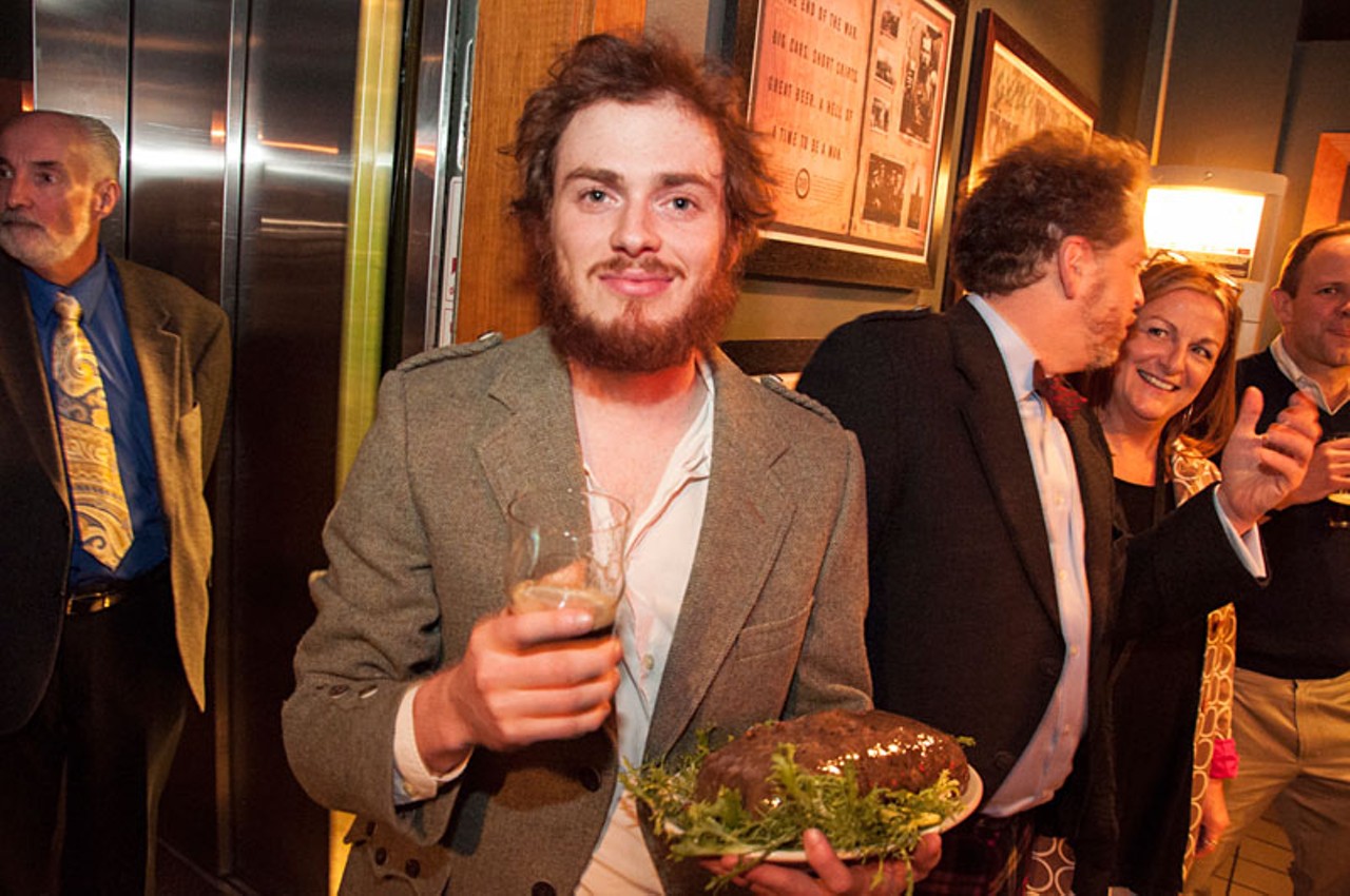 Lewis Kopman holds the haggis and a Scotch Ale.