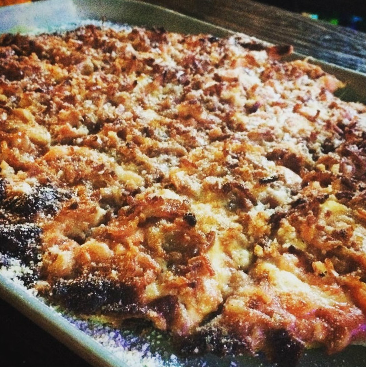 Immerse yourself in north county pizza at BJ's Bar and Restaurant
It's a thing you can't get anywhere else in the nation, and it's incredibly tasty. Pro tip: If you hit BJ's on a weeknight, cans of beer are buy-one-get-one. Photo courtesy of Instagram / graceylu1309.