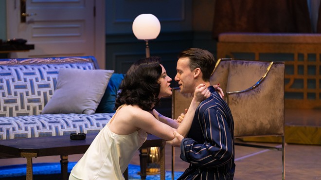 Amanda (Amelia Pedlow) and Elyot (Stanton Nash) can’t deny their mutual affection in a scene from Noel Coward’s Private Lives.