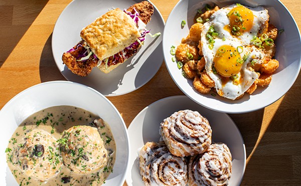 A selection of items from the Biscuit Joint (clockwise from top left): Creole Cam biscuit sandwich, loaded tots, TBJ cinnamon rolls, and two biscuits with mushroom and sage gravy.