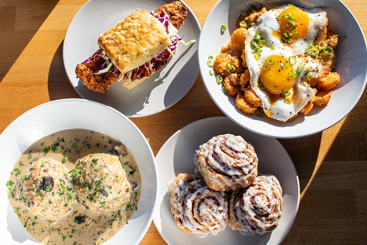 A selection of items from the Biscuit Joint (clockwise from top left): Creole Cam biscuit sandwich, loaded tots, TBJ cinnamon rolls, and two biscuits with mushroom and sage gravy.