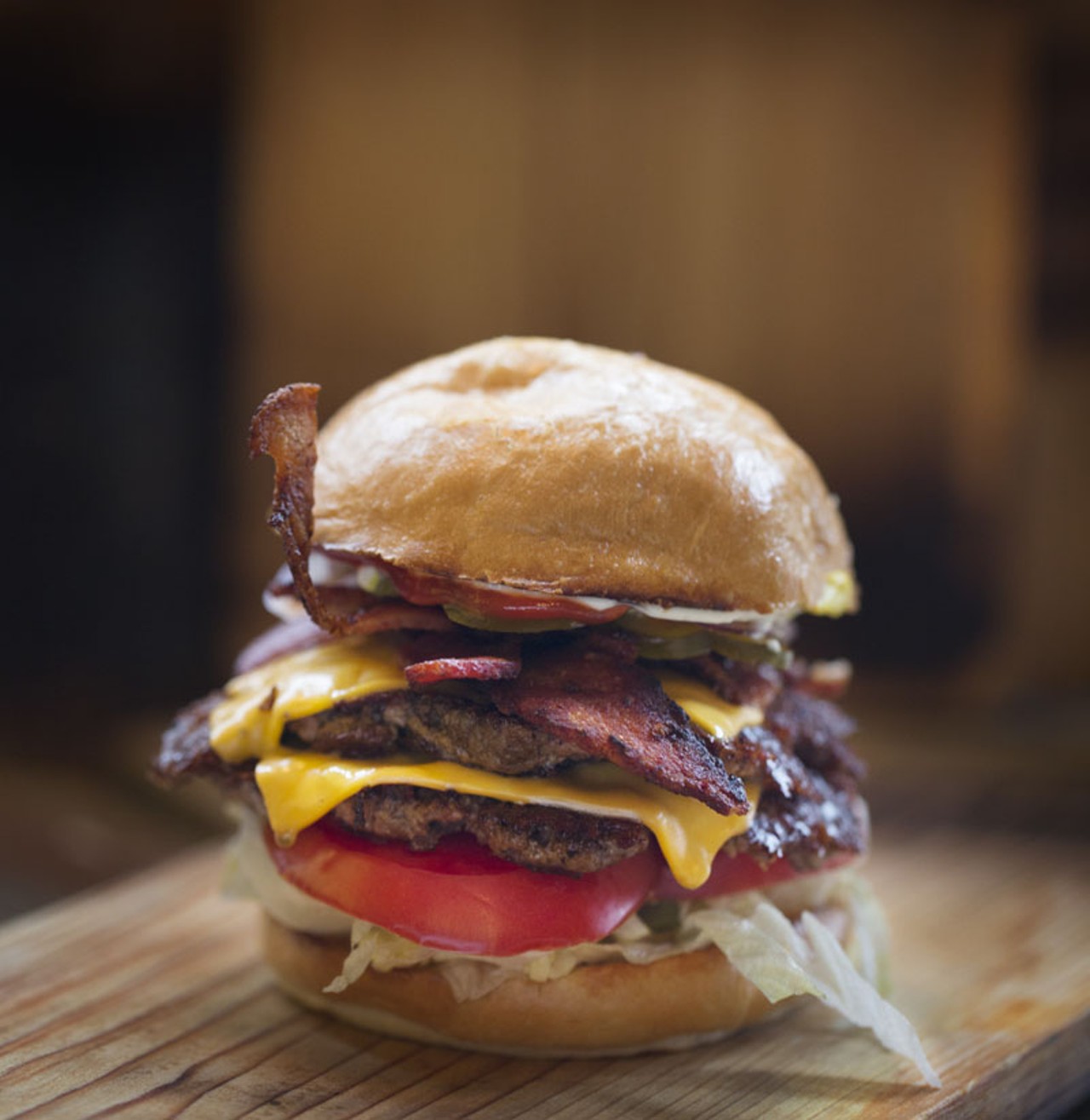 The build-your-own-burger option shown here is a double burger with cheese, bacon, pickle, onion, lettuce and tomato.