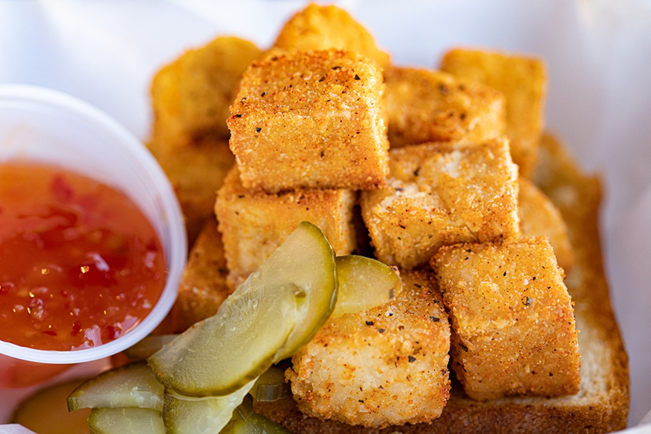 Marinated crispy tofu on garlic toast, served with pickles. Pictured here with sweet chili sauce.