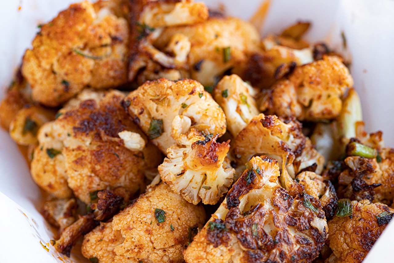 Roasted cauliflower tossed in roasted red pepper sauce.
