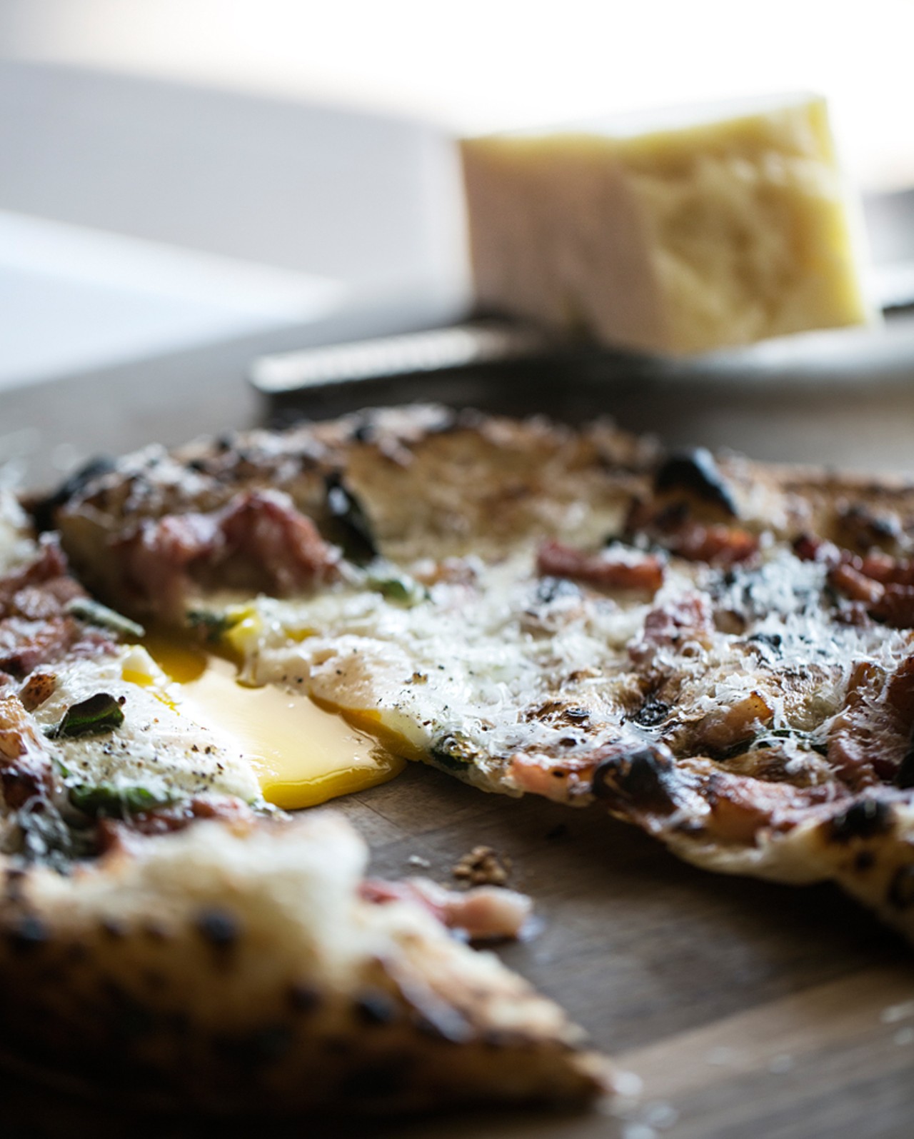 The Good Pie's "Mastunicola Pizza," topped with egg, cured pork belly, parmigiano and sage.