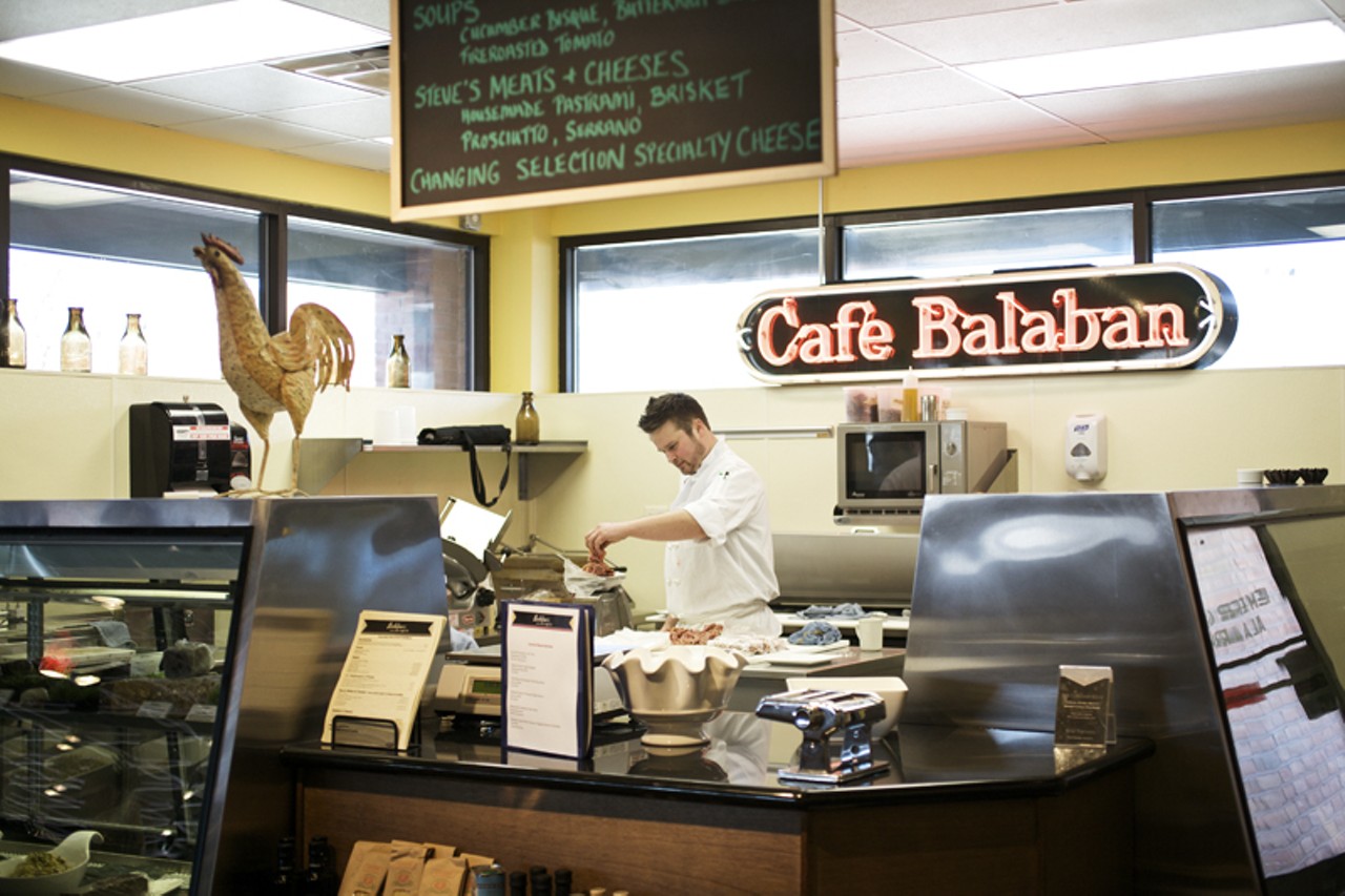 The new Balaban&rsquo;s has multiple offerings for its guests: a tapas bar and partly a wine cellar, deli and gift shop. This photo shows off the deli counter with an old Caf&eacute; Balaban sign.