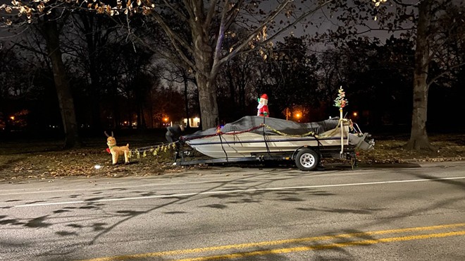 Santa atop an abandoned boat on Arsenal.