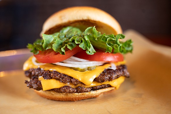 Double cheeseburger with four-ounce beef patties, American cheese, lettuce, tomato, onion and pickles.