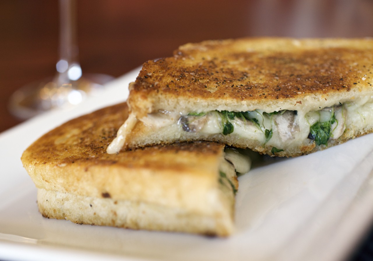 A twist on a traditional grilled cheese sandwich&hellip; Ernesto&rsquo;s is constructed with wild mushrooms, sharp white cheddar cheese, black truffle Fontina and white truffle oil.