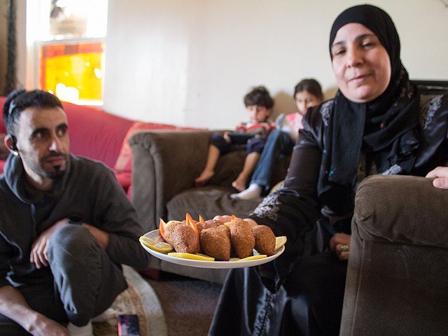 Iman Alkrad is the matriarch of one of a handful of Syrian refugee families still living in a run-down apartment complex in north St. Louis.