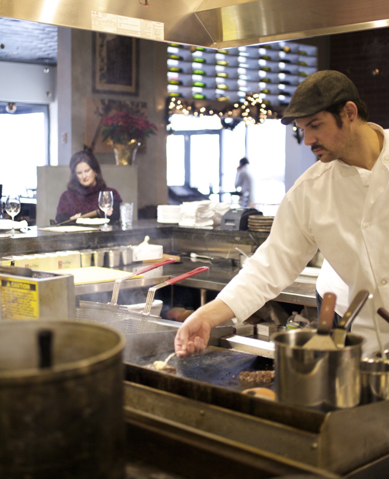 Chef de Cuisine Jeff Hubbard at work in the open kitchen at the Tavern Kitchen & Bar.