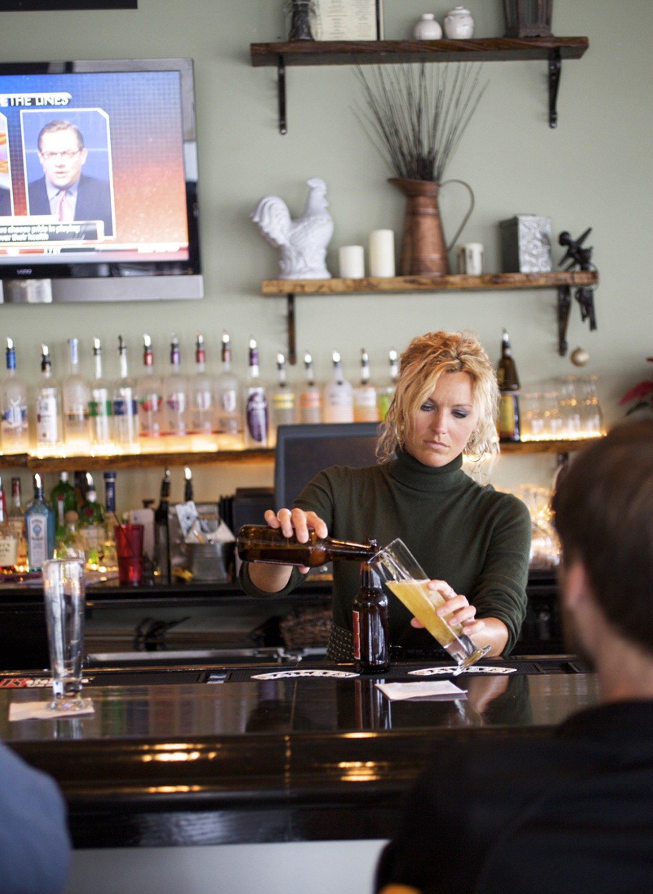 Co-owner Brooke Curtis behind the bar at The Tavern Kitchen & Bar.
