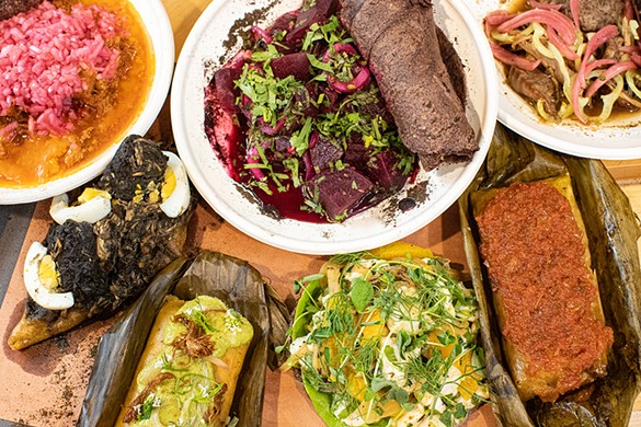 A selection of dishes from Sureste: cochinita pibil, local beets marinated in citrus, pavo en escabeche, Mayan fried roll with local turkey and meatballs, mushroom tamale, ceviche and vaporcito tamale.