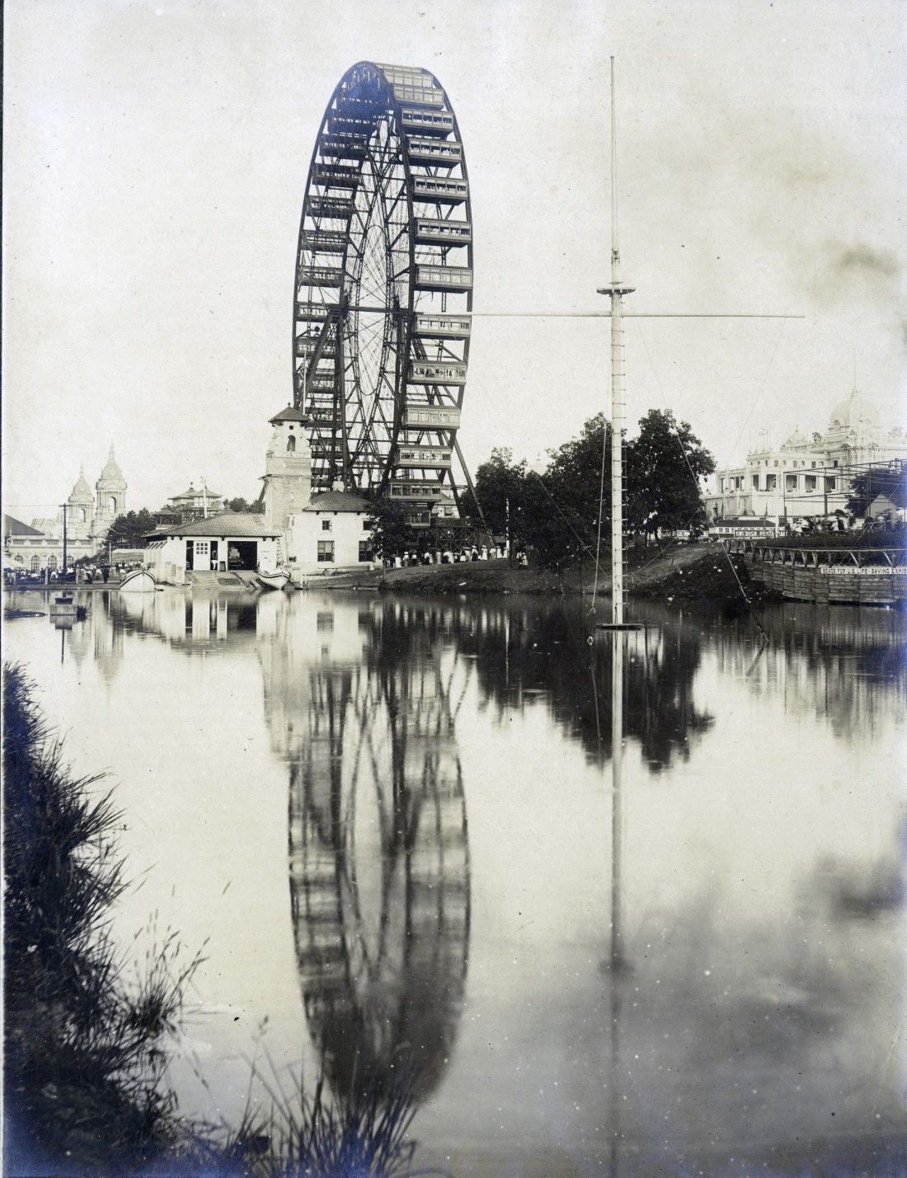 OBSERVATION WHEEL AND THE U.S.A. LIFE SAVING STATION AT THE 1904 WORLD'S FAIR. (FERRIS WHEEL).
Find out more about this photo at MoHistory.org.