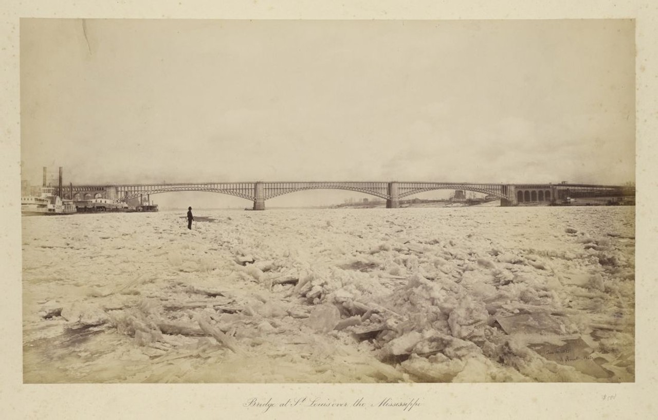 BRIDGE AT ST. LOUIS OVER THE MISSISSIPPI, JANUARY 10, 1875
"Yesterday I went in company with some ladies and gentlemen, and we walked over on the ice to the Illinois shore. Don't be alarmed, for the icee is 5 or 6 inches thick and they are constantly passing over with horses and loaded sleighs. Indeed while we were on the ice, a man passed us with a sleigh load of coffee in sacks at a full gallop. The river is covered with skaters cutting all sorts of capers."&#151; J.F. Sowell, 1845
Bridge at St. Louis over the Mississippi, January 10, 1875. Albumen silver print, Robert Benecke. Missouri Historical Society Collections.
