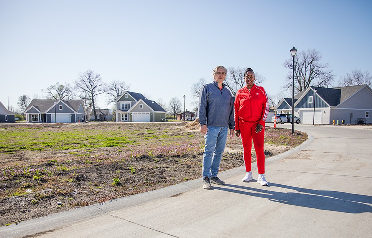 Mark Mestemacher, left, and Jackie Joyner-Kersee in the housing subdivision they helped to build — East St. Louis' first market-rate housing development in 40 years.
