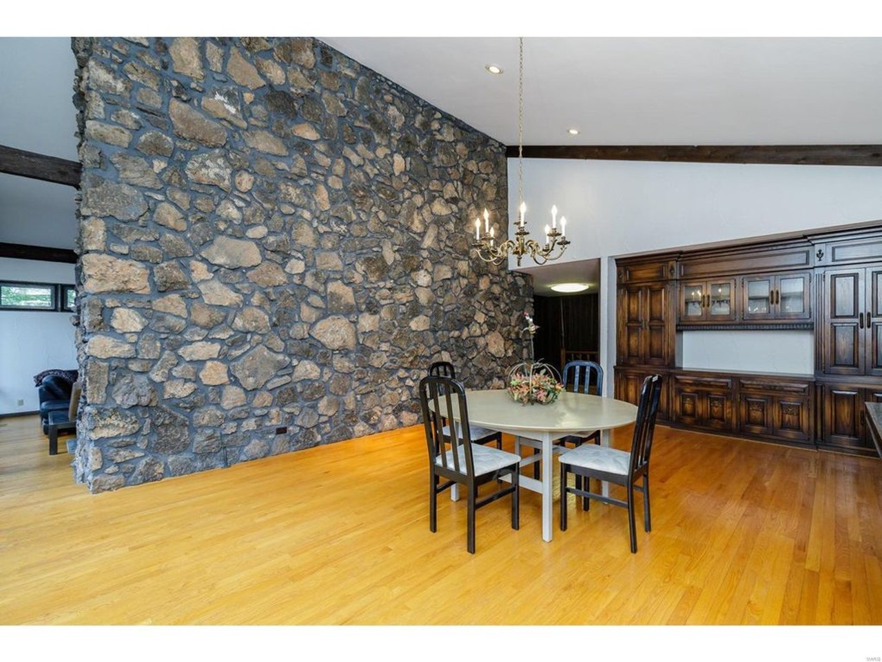 This Modern House Has a Rock Wall and a Huge Bar in the Basement [PHOTOS]