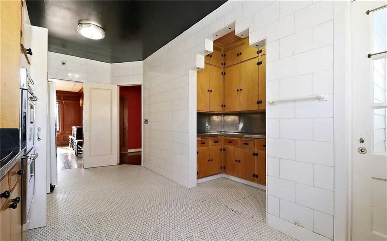 This Time Capsule Art Deco Missouri House Has a Sexy Bar in the Basement