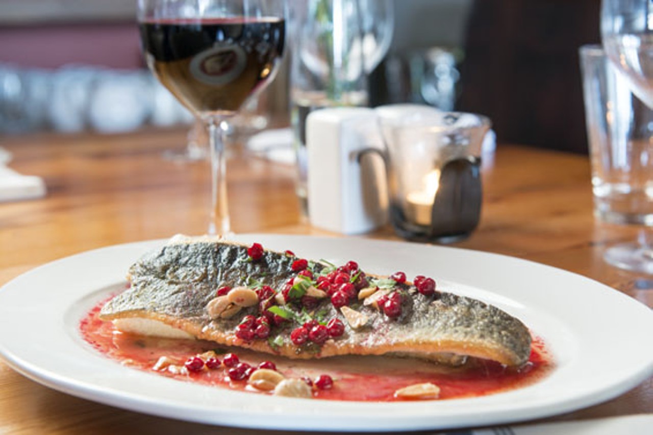 The trout, with Marcona almond, lingonberry, herbs and horseradish flan.