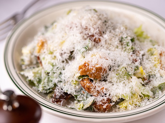 Wright's Tavern's Caesar is so covered in  Parmigiano-Reggiano you can't see the green of the leaves.