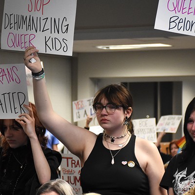 Students protest the policy under consideration by the Francis Howell School Board at a board meeting on November 16.
